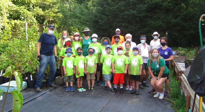 nature camp participants at the tree nursery