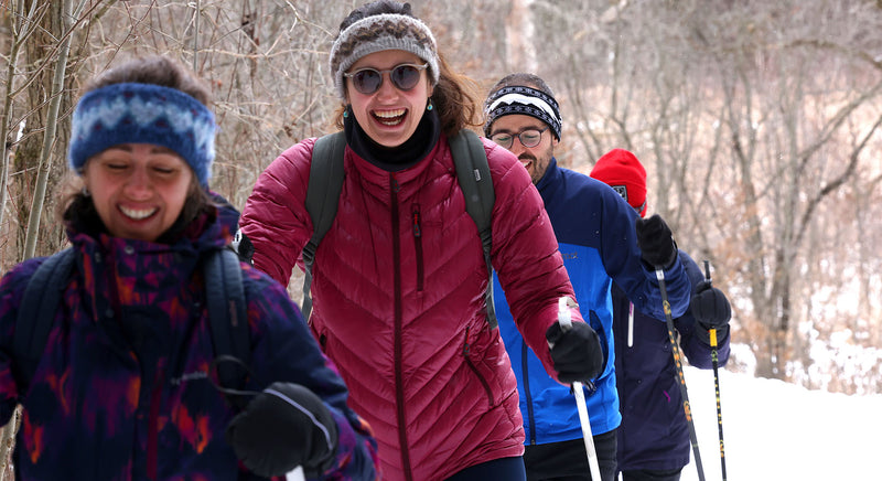 people cross country skiing